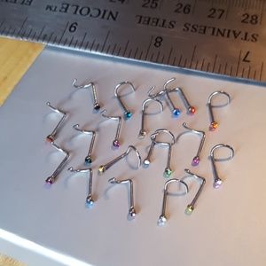 Lot of 19 screw or twist type nose rings 20ga